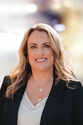 Portrait of Currie Hinz, REALTOR® | e-PRO® | NRLUX